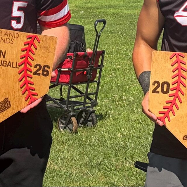 Ben's Etsy customer photo of baseball players holding their personalized senior night plaques