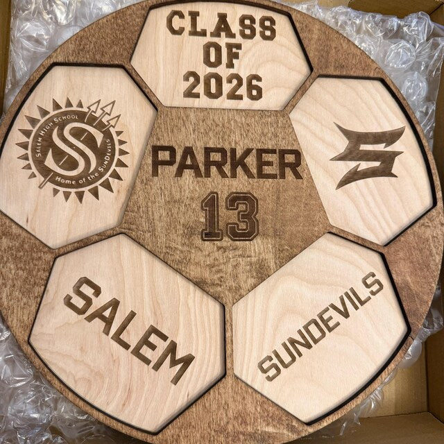 Laura’s Etsy customer photo of a personalized senior soccer plaque