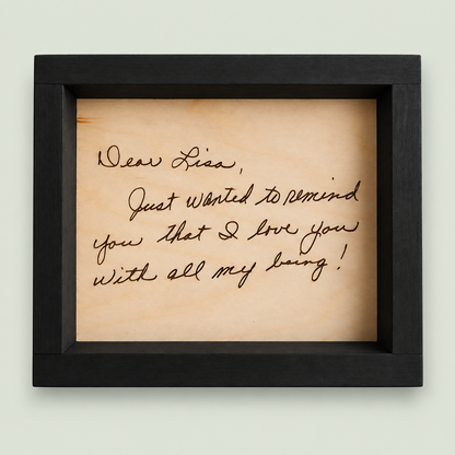Black-framed wooden keepsake engraved with a handwritten Dear Lisa letter on soft sage.