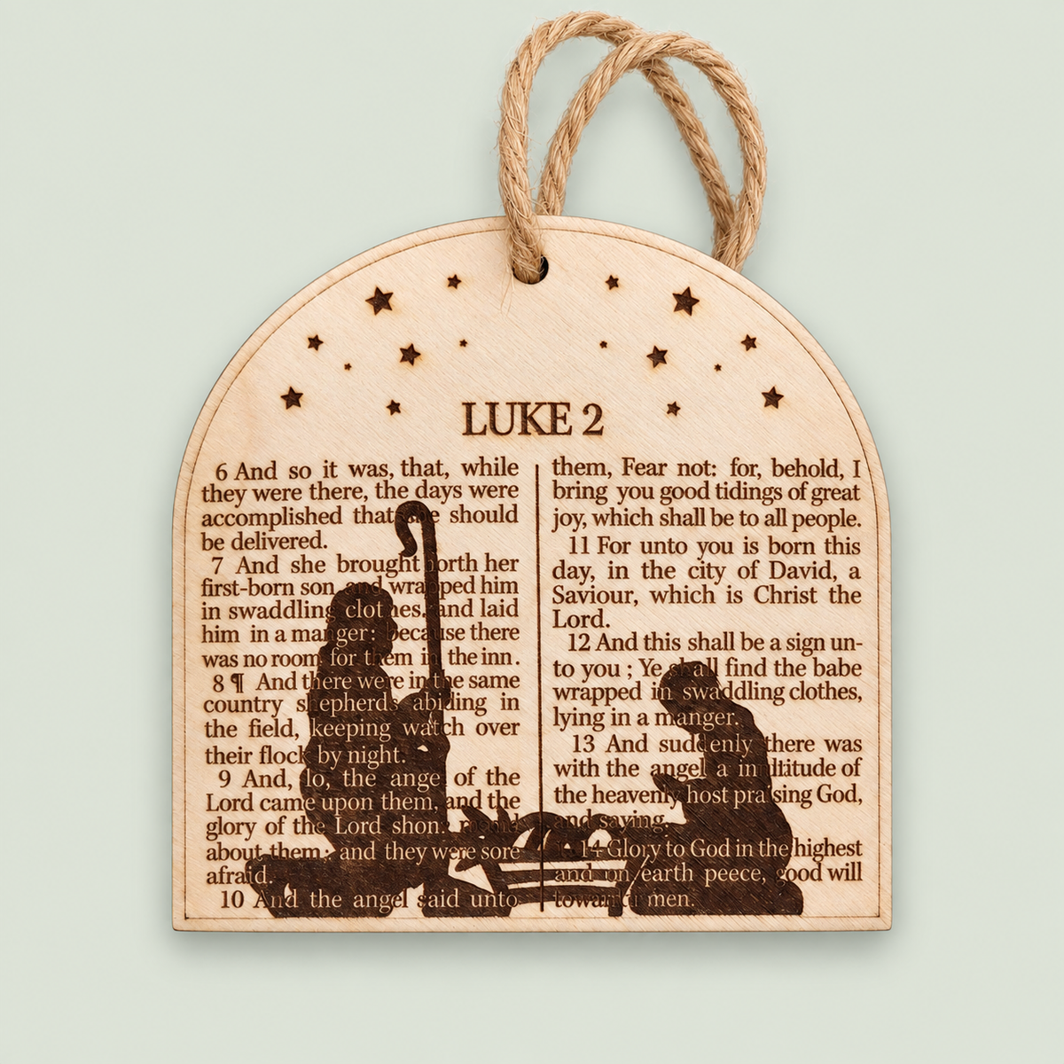 Wooden Luke 2 nativity ornament with Bible verses, Holy Family silhouettes and a jute hanger.