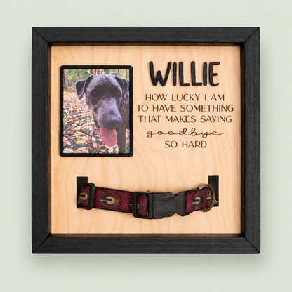 Black pet memorial frame with Willie's photo, name and red collar on soft sage.
