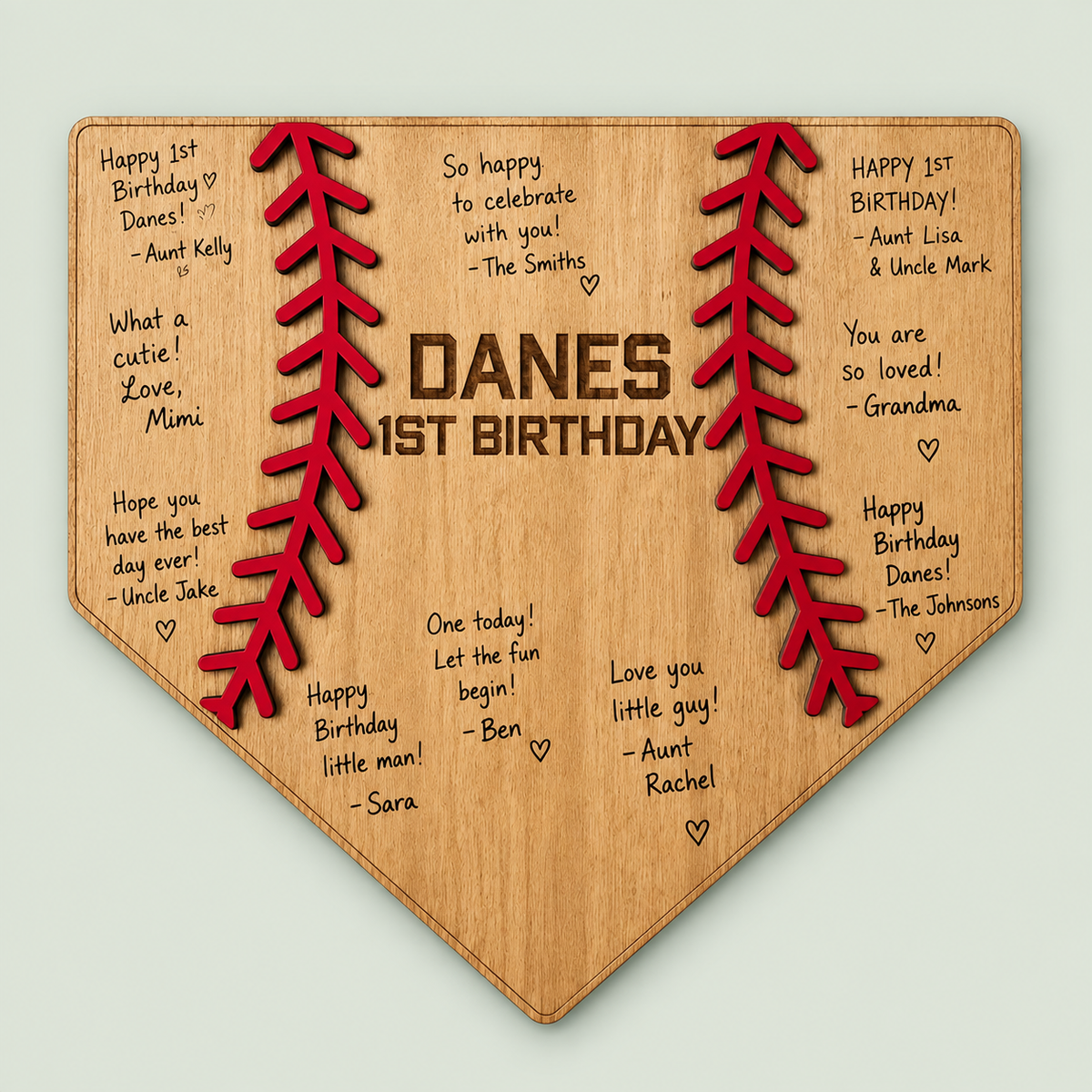 Personalized wooden baseball home plate guest book for a first birthday celebration on soft sage.