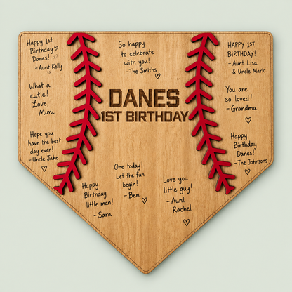 Personalized wooden baseball home plate guest book for a first birthday celebration on soft sage.